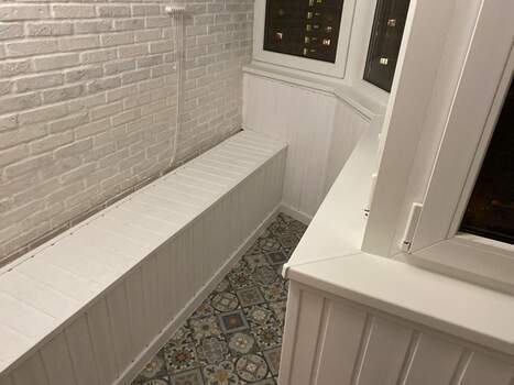 Отделка камнем с утеплением балкона Сапожок