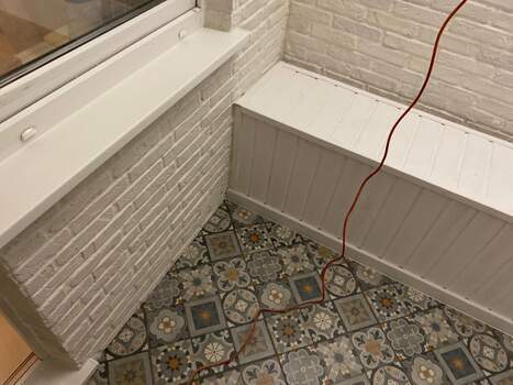 Отделка камнем с утеплением балкона Сапожок